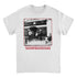 White t-shirt with a graphic of a band and people on a train platform, featuring text &