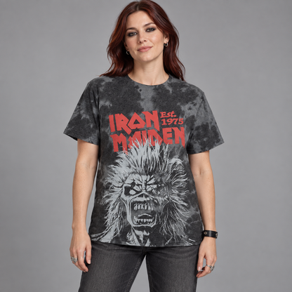 Woman wearing the charcoal-wash Iron Maiden Jumbo Scream Head T-shirt with red lettering and oversized Eddie artwork in a studio.