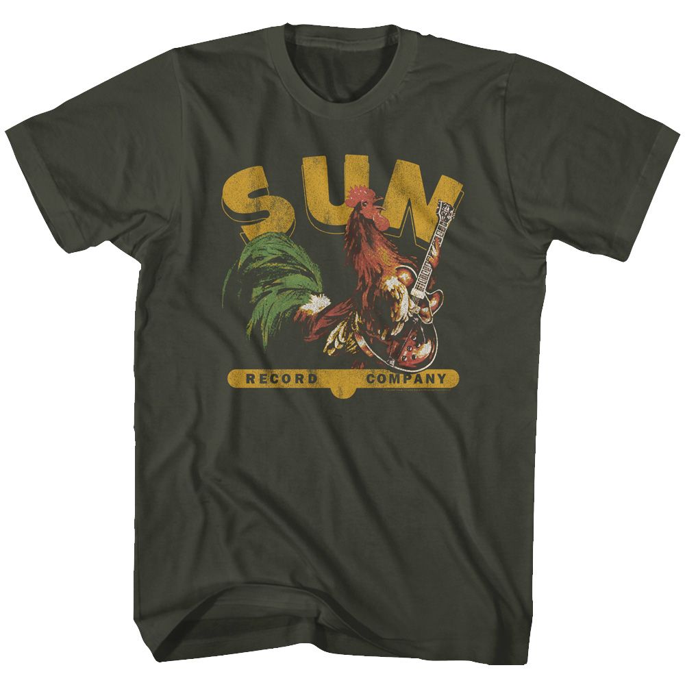 A black t-shirt featuring a colorful graphic of a rooster playing a guitar with the text &